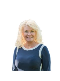 Lynn L. Moore - RE/MAX Executives