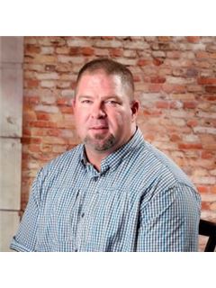 Rollie Walker - RE/MAX Unlimited