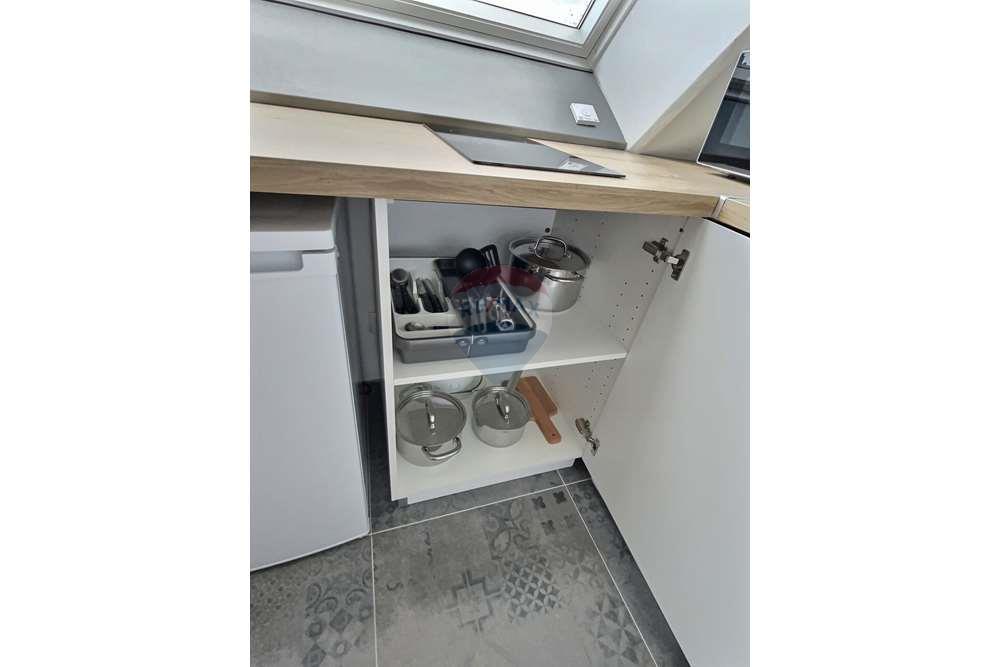 Studio - A louer - Luxembourg - Cuisine rangement bas.jpeg - 280221031-190