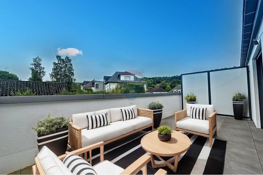 Maison mitoyenne - A vendre - Oetrange - Balcon.jpeg - 280371001-5