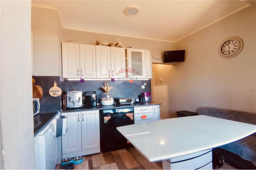 Апартамент - За продажба - гр. Балчик, Област Добрич, България - Оборудвана кухня с усвоена тераса - Кухня - 360321025-246