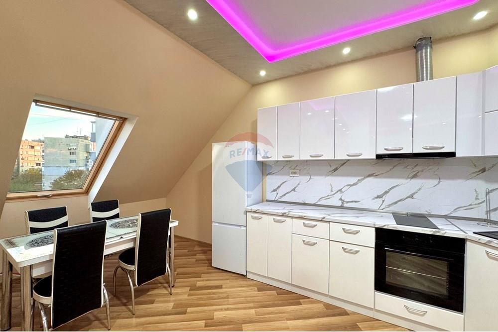 Апартамент - За продажба - гр. Русе, Област Русе, България - IMG_3692.JPEG - Кухня към всекидневната - 360451033-100