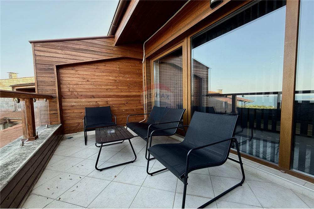 Апартамент - За продажба - гр. Балчик, Област Добрич, България - Открита панорамна тераса /изток/ с живописна панорамна гледка към морето и белите скали на Балчик и достъп от всекидневна - Тераса - 360321025-234