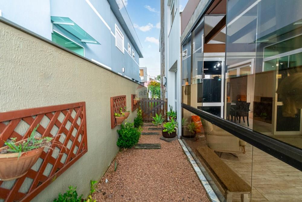 Casa de Condomínio - Venda - Gravataí , Rio Grande do Sul - lateral esquerda.jpg - 610161022-30