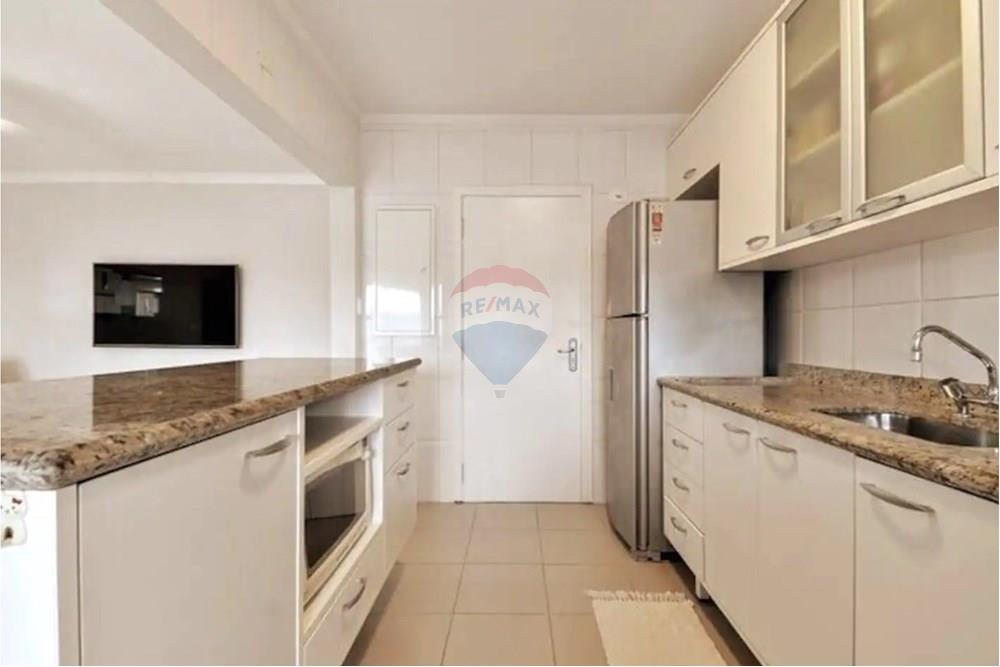Apartamento - Venda - Guarujá , São Paulo - Cozinha com sala de estar no fundo.jpg - 690981026-603