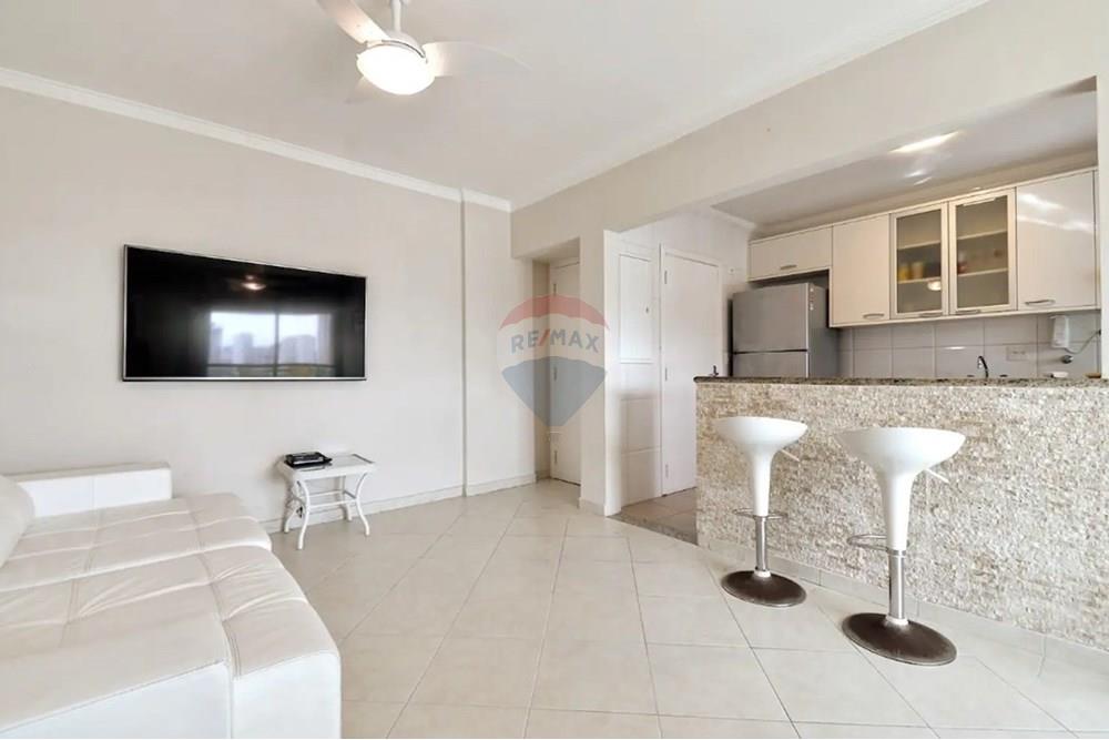 Apartamento - Venda - Guarujá , São Paulo - Sala de estar com suporte e bar ao fundo.jpg - 690981026-603