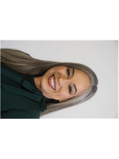 Briseida Caraballo - RE/MAX REAL REALITY 